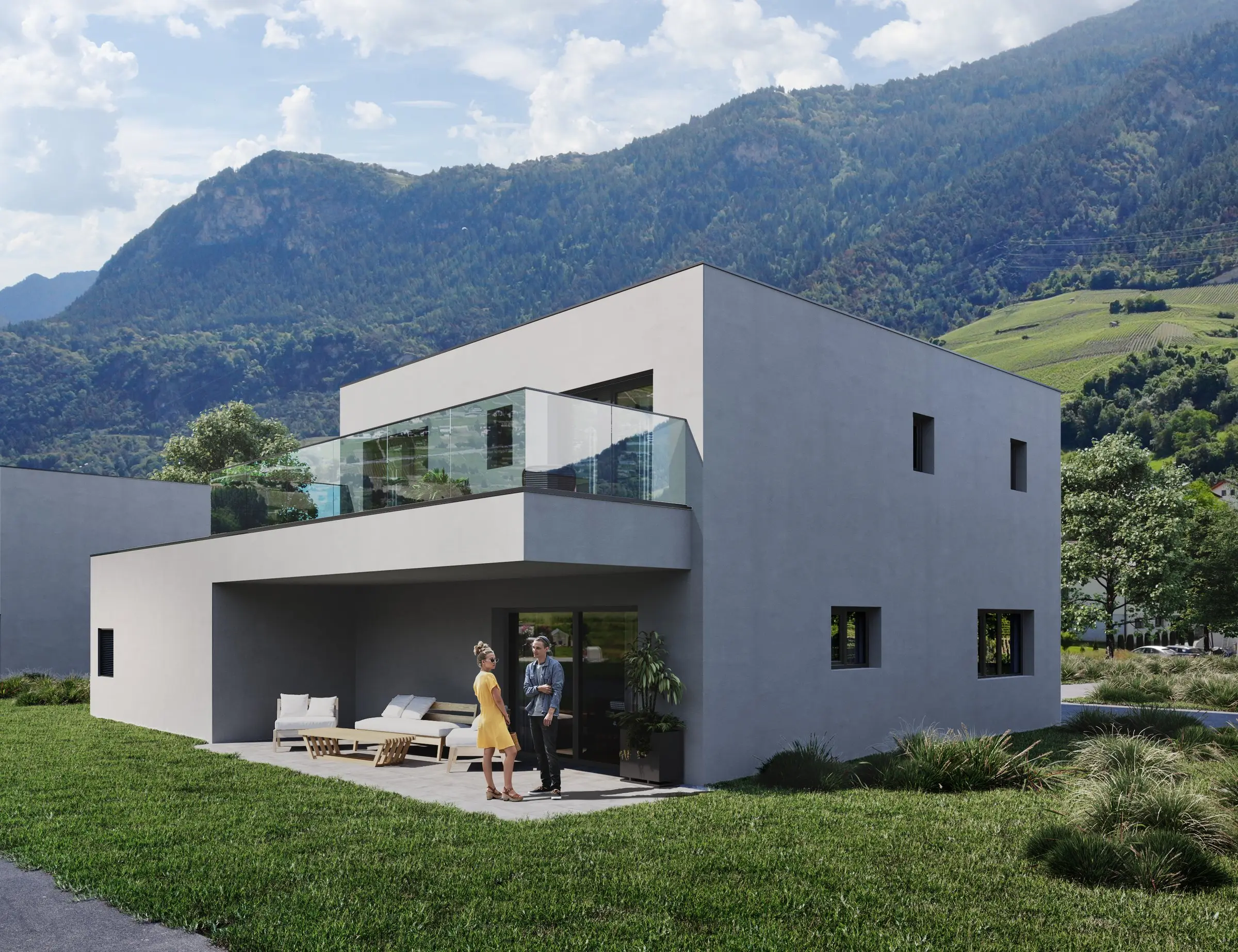 Villa Tritus à Chalais, volume gris clair à toit plat, terrasse couverte et étage en porte-à-faux, coteau en arrière-plan