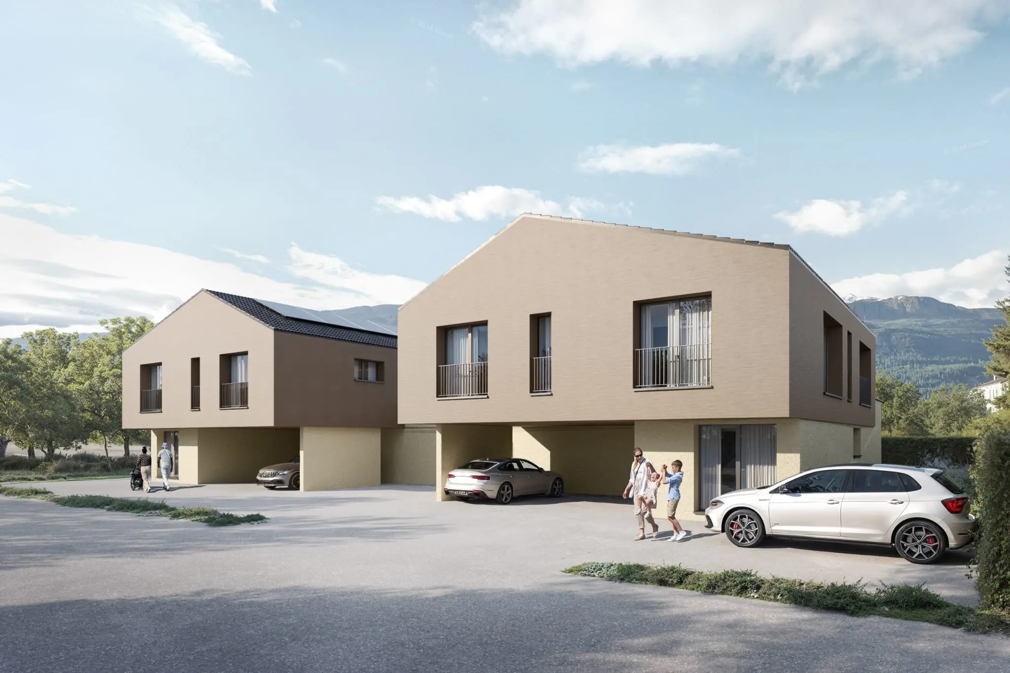 Le Domaine de Tsan Usou vu depuis la rue, trois bâtiments à toit à deux pans, façades en bois clair sur un rez en béton avec couverts à voitures